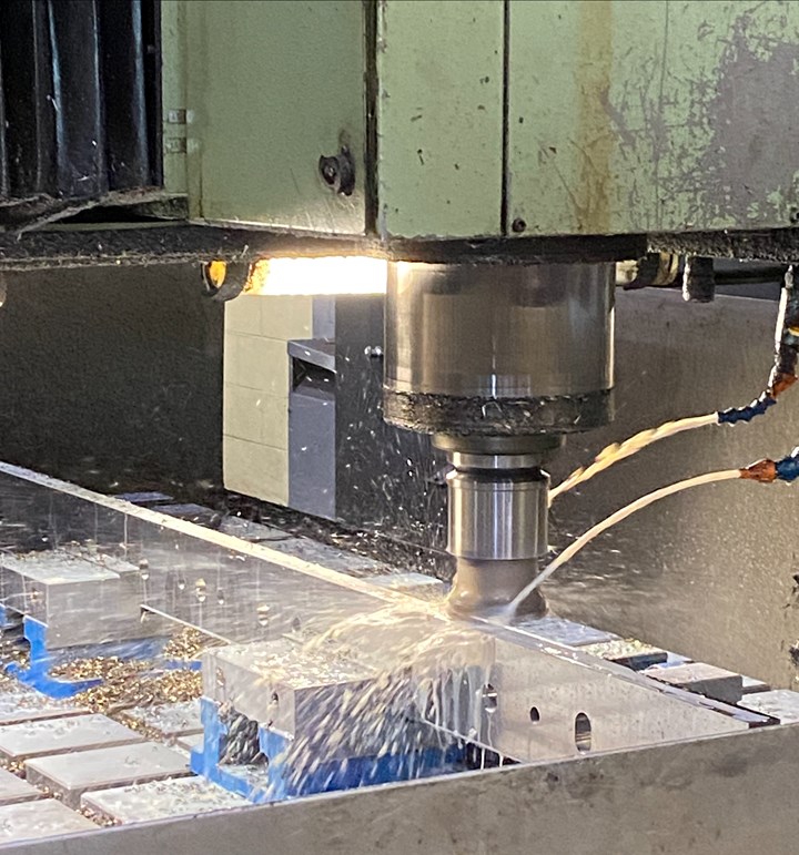 Vertical machining center milling a part
